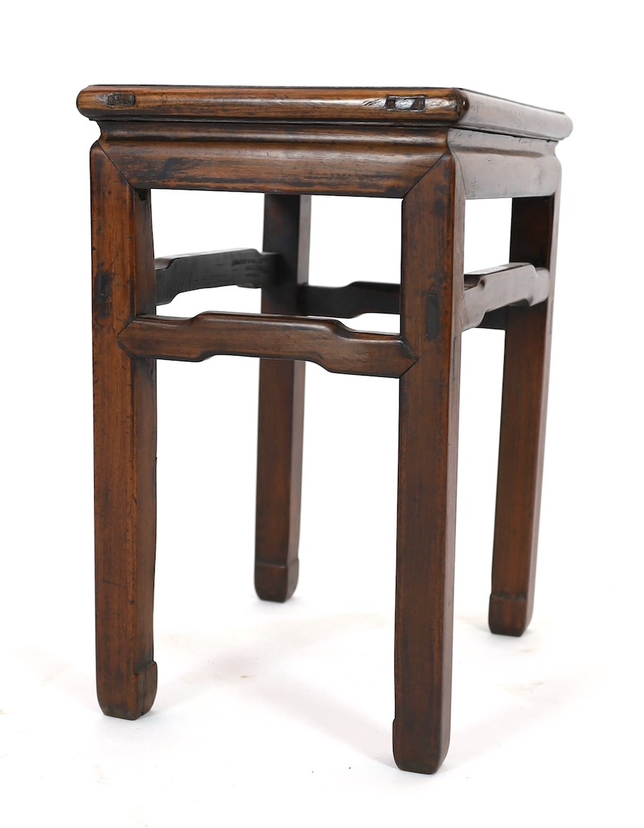 A Chinese huanghuali and hongmu stool, 18th/19th century, 40.5cm wide, 30.5cm deep, 50.5cm high